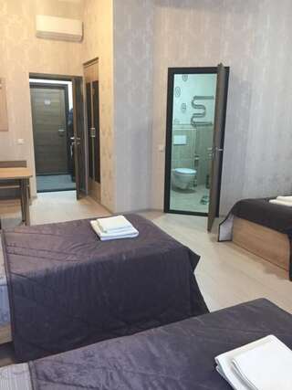 Отель Hotel Byg Брест Четырехместный номер с душем-8